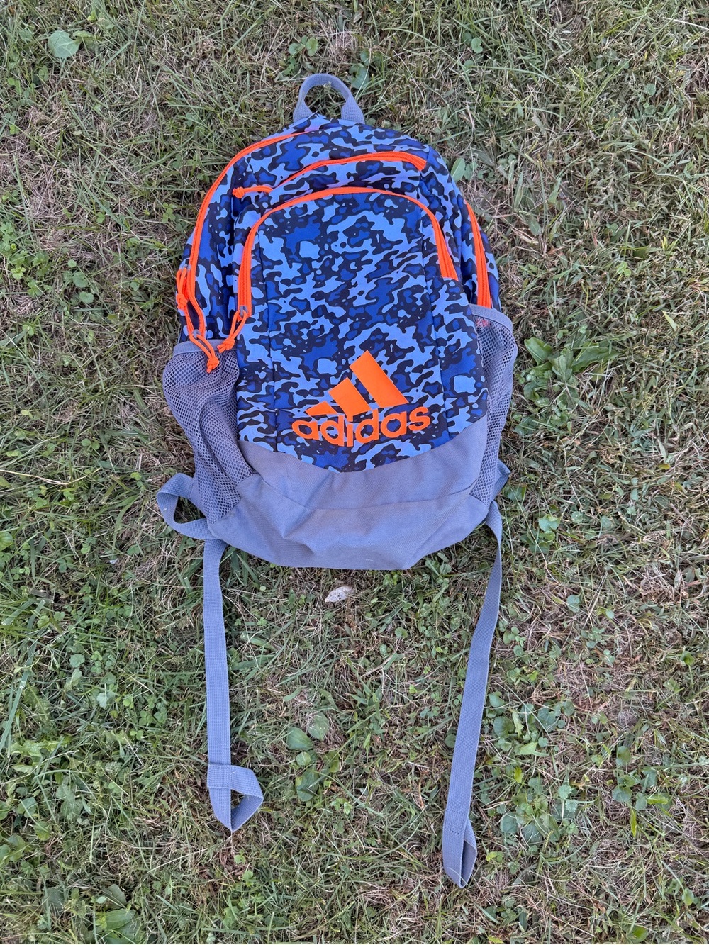 adidas Kids Blue Camo Backpack with Orange Details and Gray Base